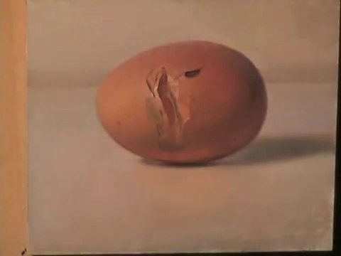 Художник разбивает яйцо на рисунке